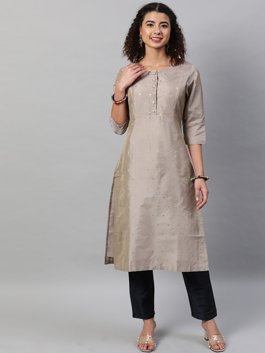 

STREET 9 Women Beige & Yellow Floral Self Design Panelled Kurta With Trousers