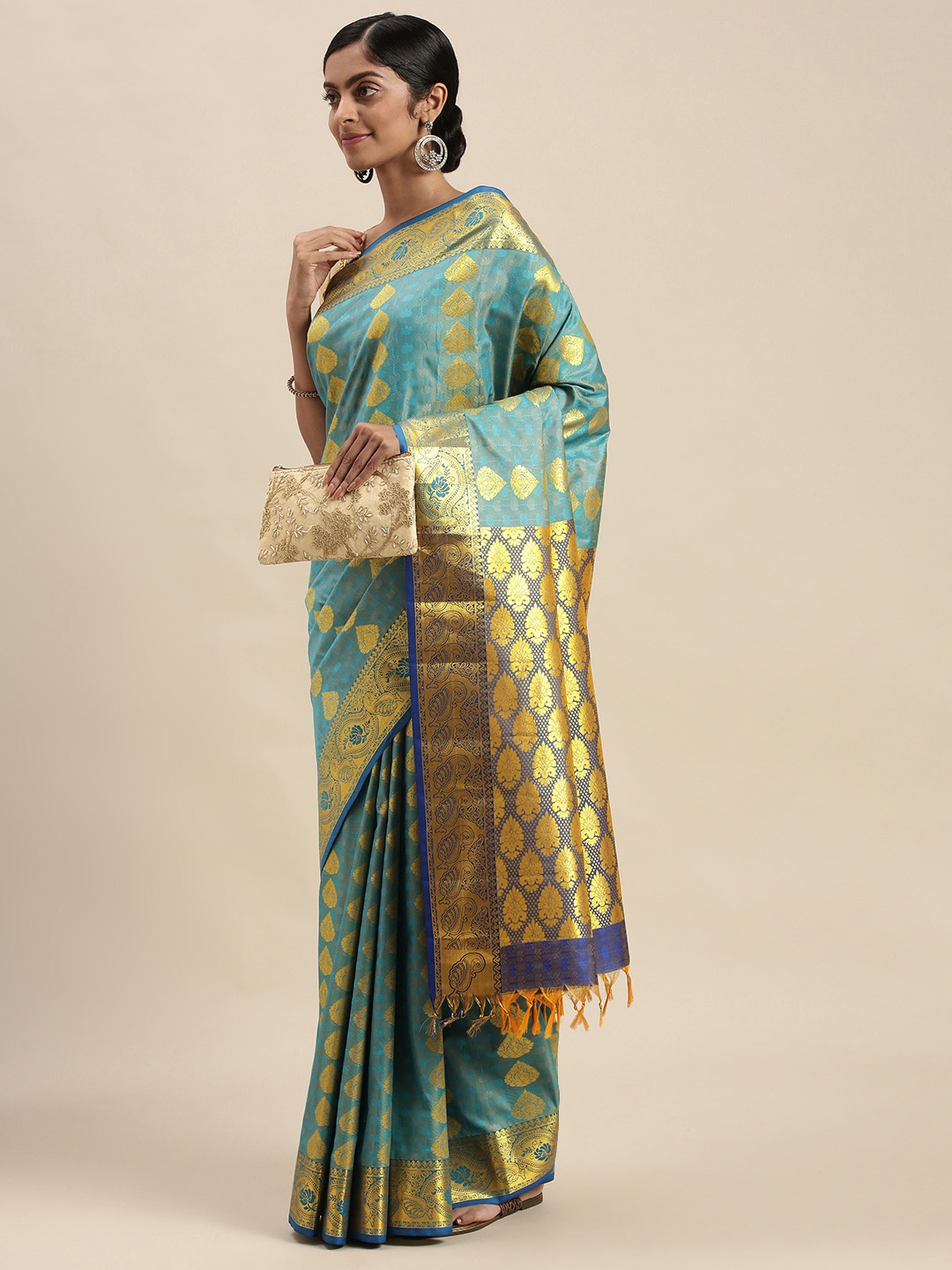 

Thara Sarees Blue & Golden Ethnic Motifs Zari Art Silk Kanjeevaram Saree