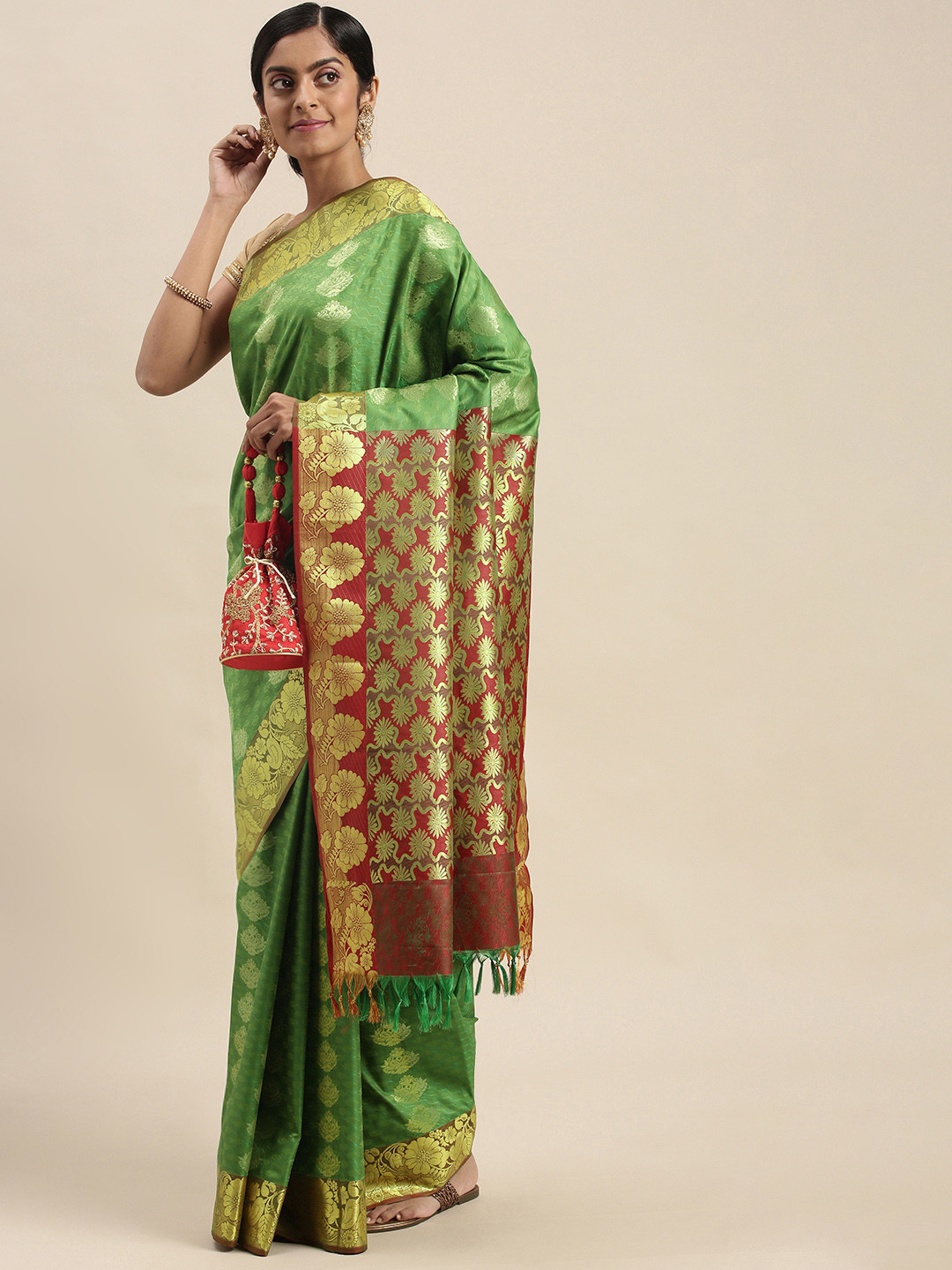 

Thara Sarees Green & Golden Ethnic Motifs Zari Art Silk Kanjeevaram Saree