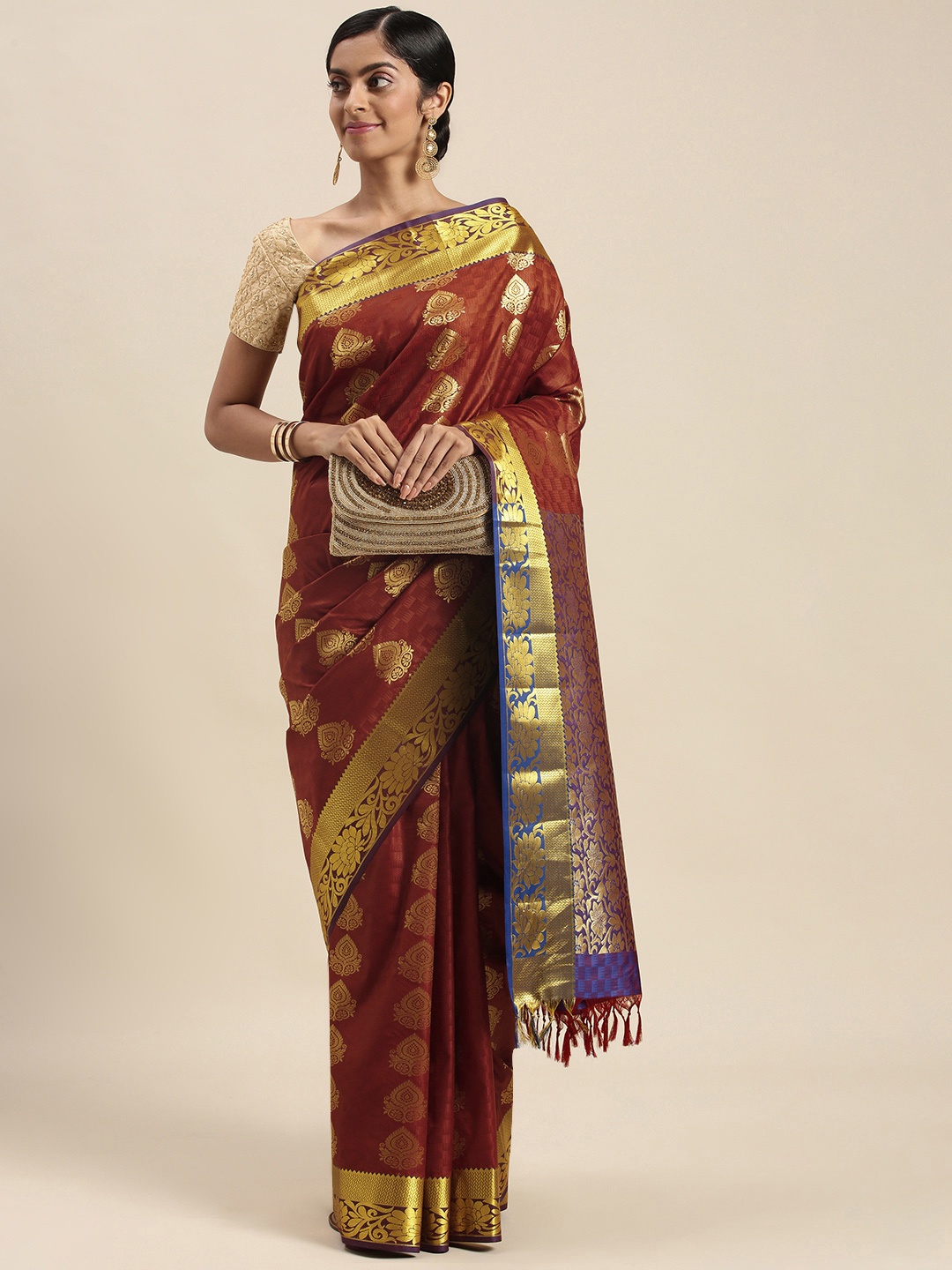 

Thara Sarees Maroon & Golden Ethnic Motifs Zari Art Silk Kanjeevaram Saree