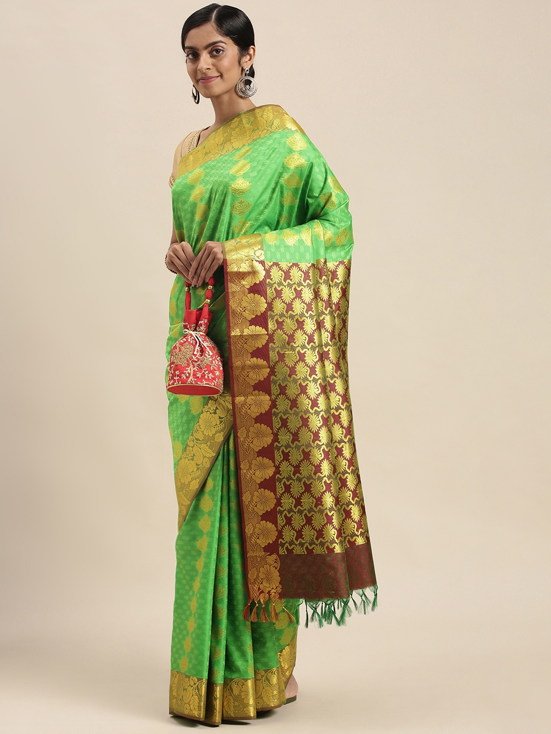 

Thara Sarees Green & Golden Ethnic Motifs Zari Art Silk Kanjeevaram Saree