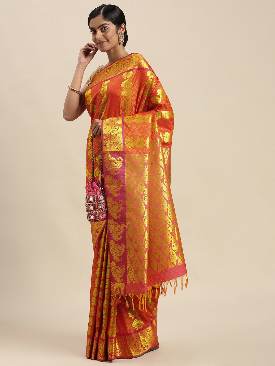 

Thara Sarees Orange & Golden Ethnic Motifs Zari Art Silk Kanjeevaram Saree