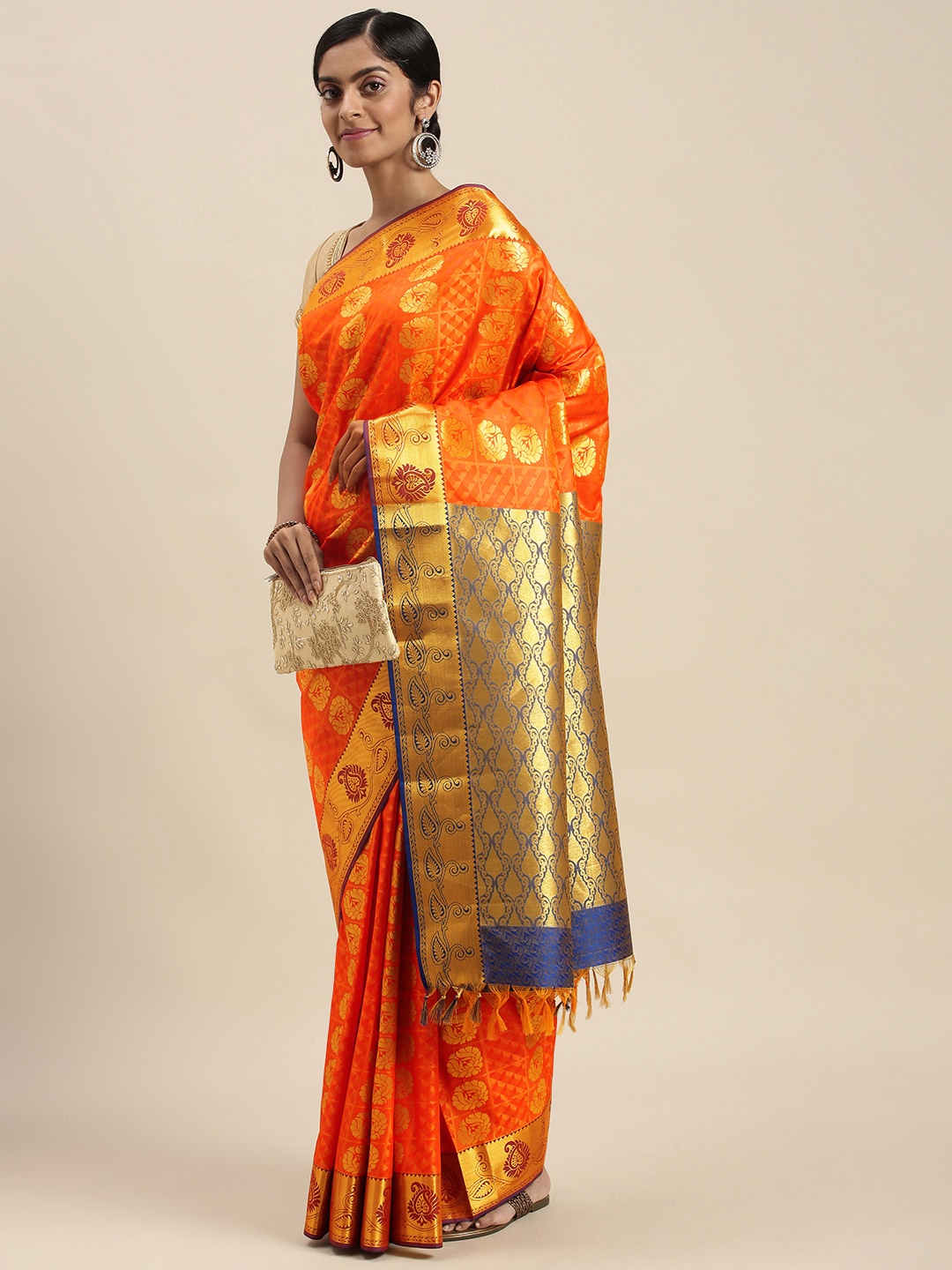 

Thara Sarees Orange & Golden Ethnic Motifs Zari Art Silk Kanjeevaram Saree