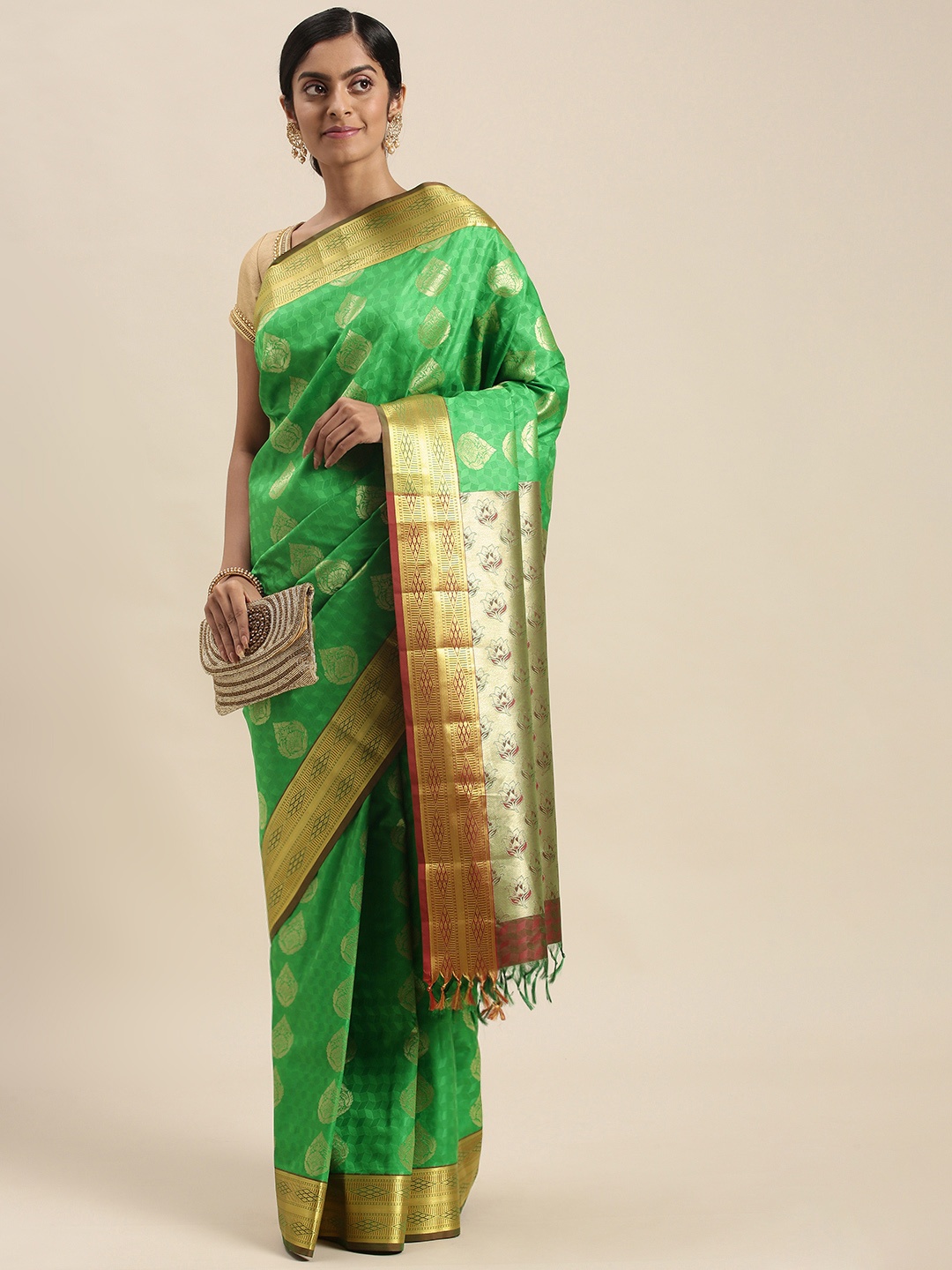 

Thara Sarees Green & Golden Ethnic Motifs Zari Art Silk Kanjeevaram Saree