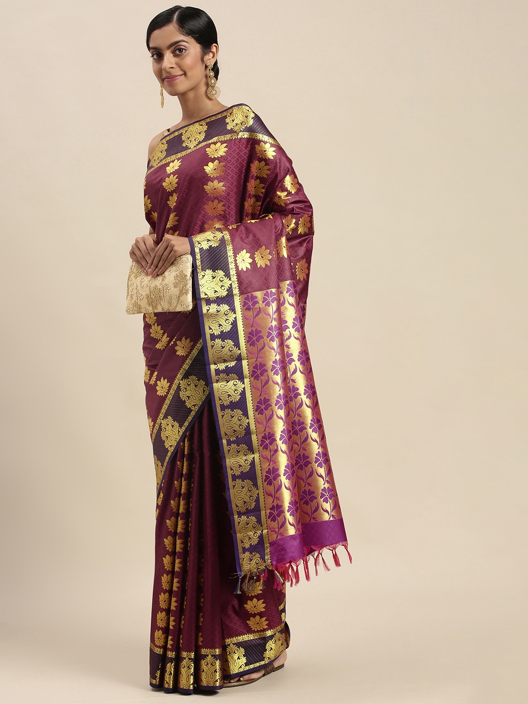 

Thara Sarees Purple & Golden Ethnic Motifs Zari Art Silk Kanjeevaram Saree