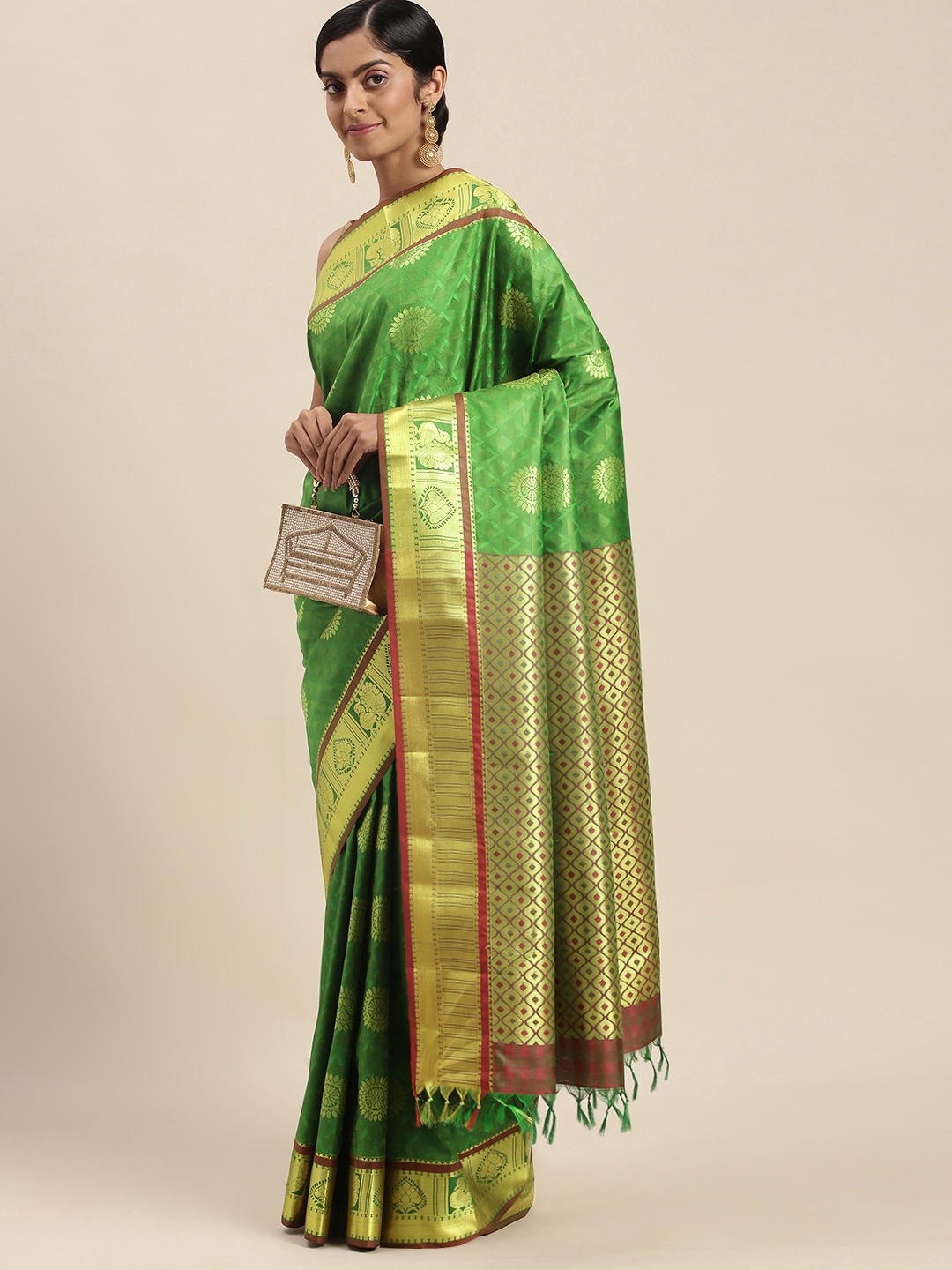 

Thara Sarees Green & Golden Ethnic Motifs Zari Art Silk Kanjeevaram Saree