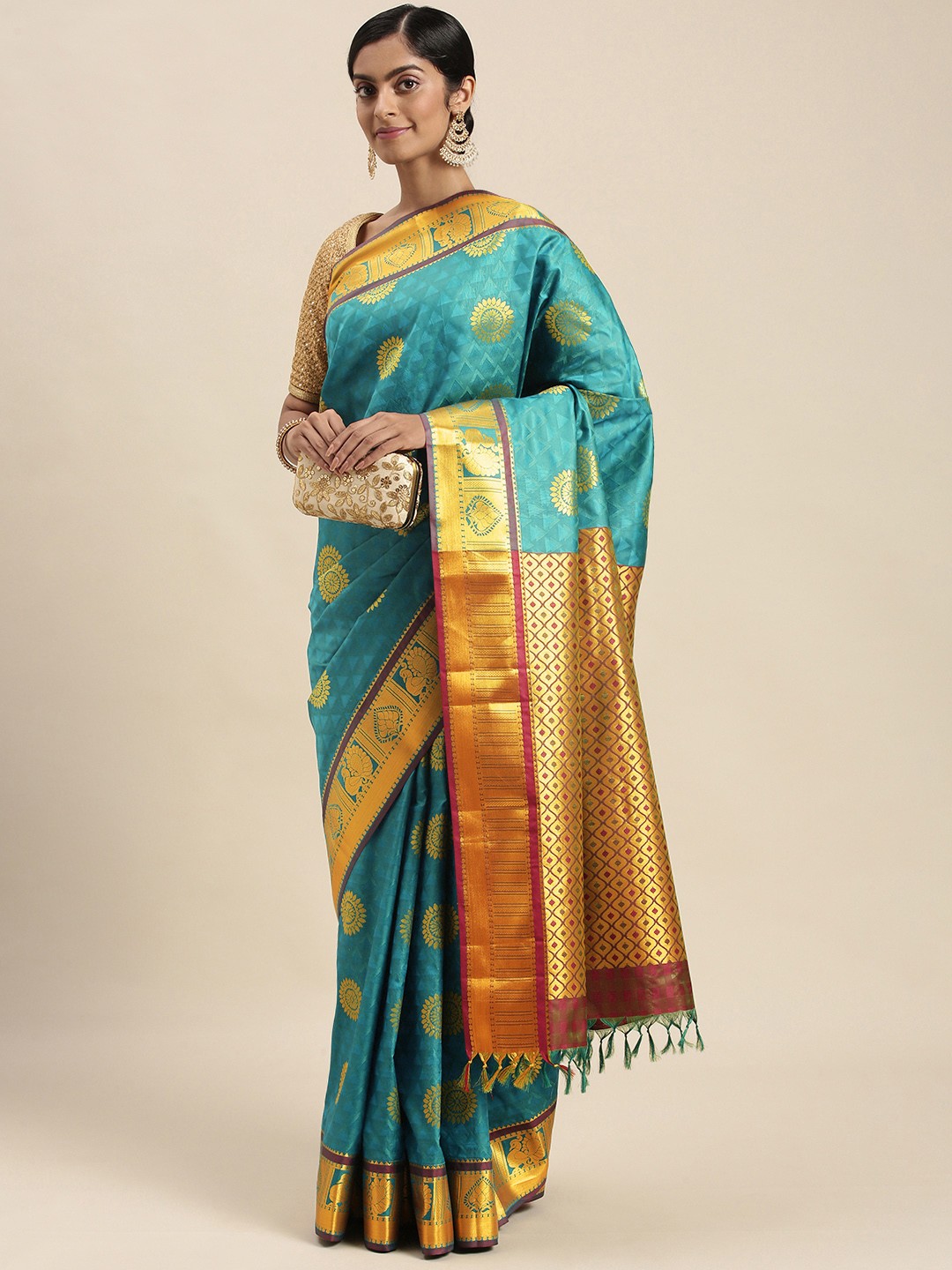 

Thara Sarees Teal Green & Golden Ethnic Motifs Zari Art Silk Kanjeevaram Saree