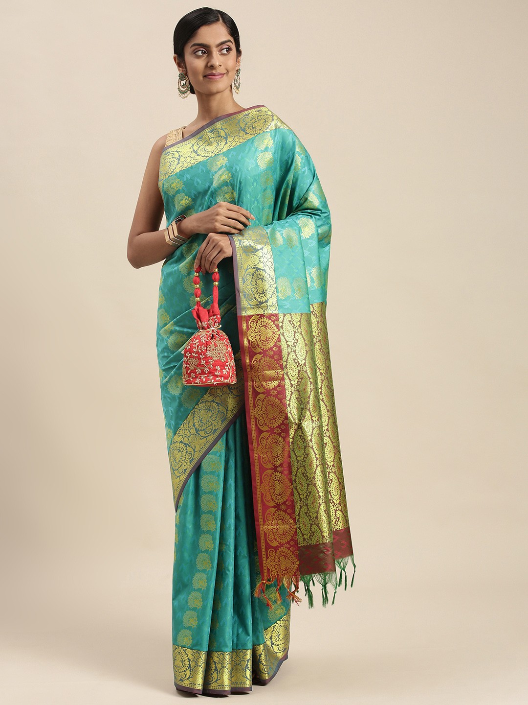 

Thara Sarees Pink & Golden Ethnic Motifs Zari Art Silk Kanjeevaram Saree