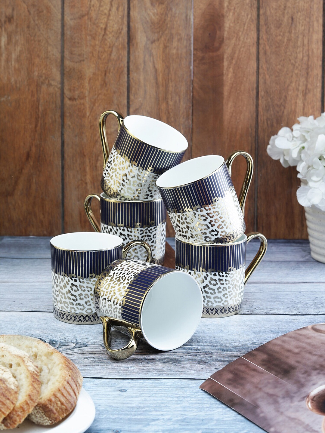

CLAY CRAFT White & Gold Toned 6 Pieces Ethnic Motifs Printed Ceramic Tea Cups 220ml