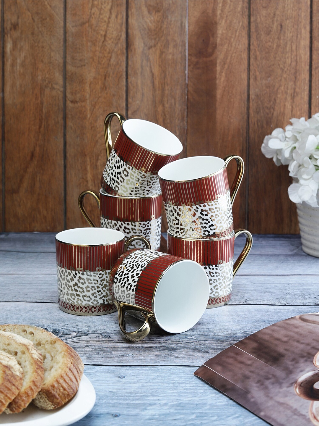 

CLAY CRAFT White & Gold Toned 6 Pieces Ethnic Motifs Printed Ceramic Tea Cups 220ml