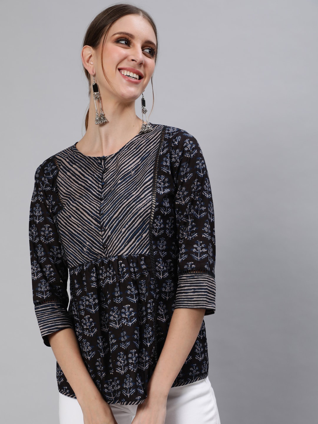 

Ishin Women Black & Blue Printed A-Line Top