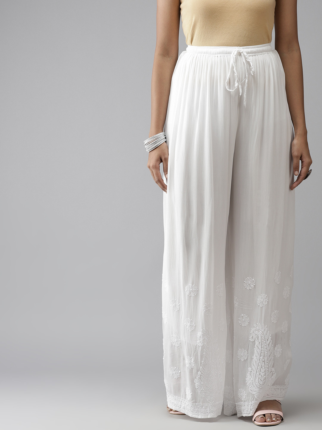 

ADA Women White Ethnic Motifs Embroidered Handloom Georgette Palazzos