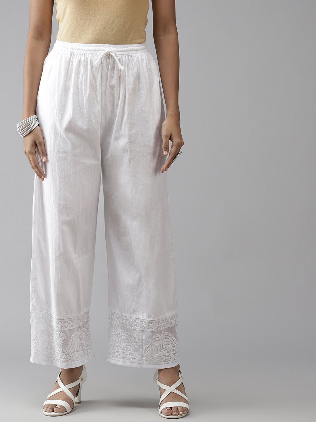 

ADA Women White Ethnic Motifs Hem Design Handloom Palazzos