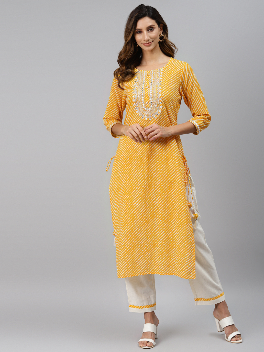 

Readiprint Fashions Women Yellow & Off White Leheriya Print Regular Kurta with Trousers