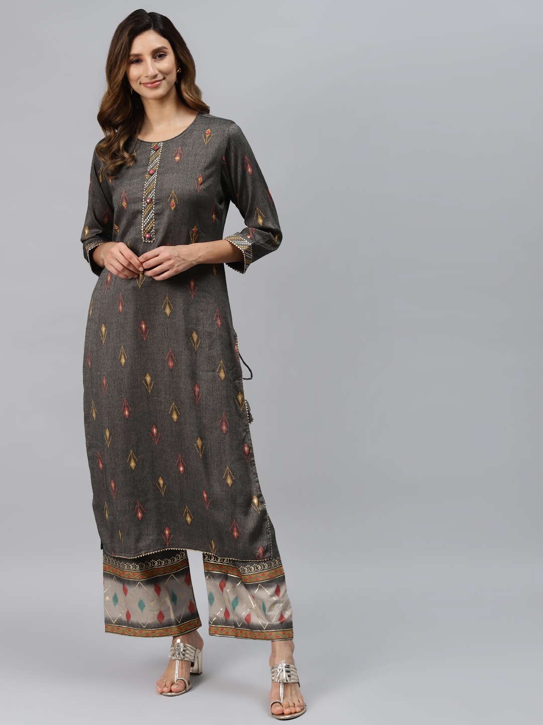

Readiprint Fashions Women Charcoal Grey & Yellow Printed Regular Kurta with Palazzos