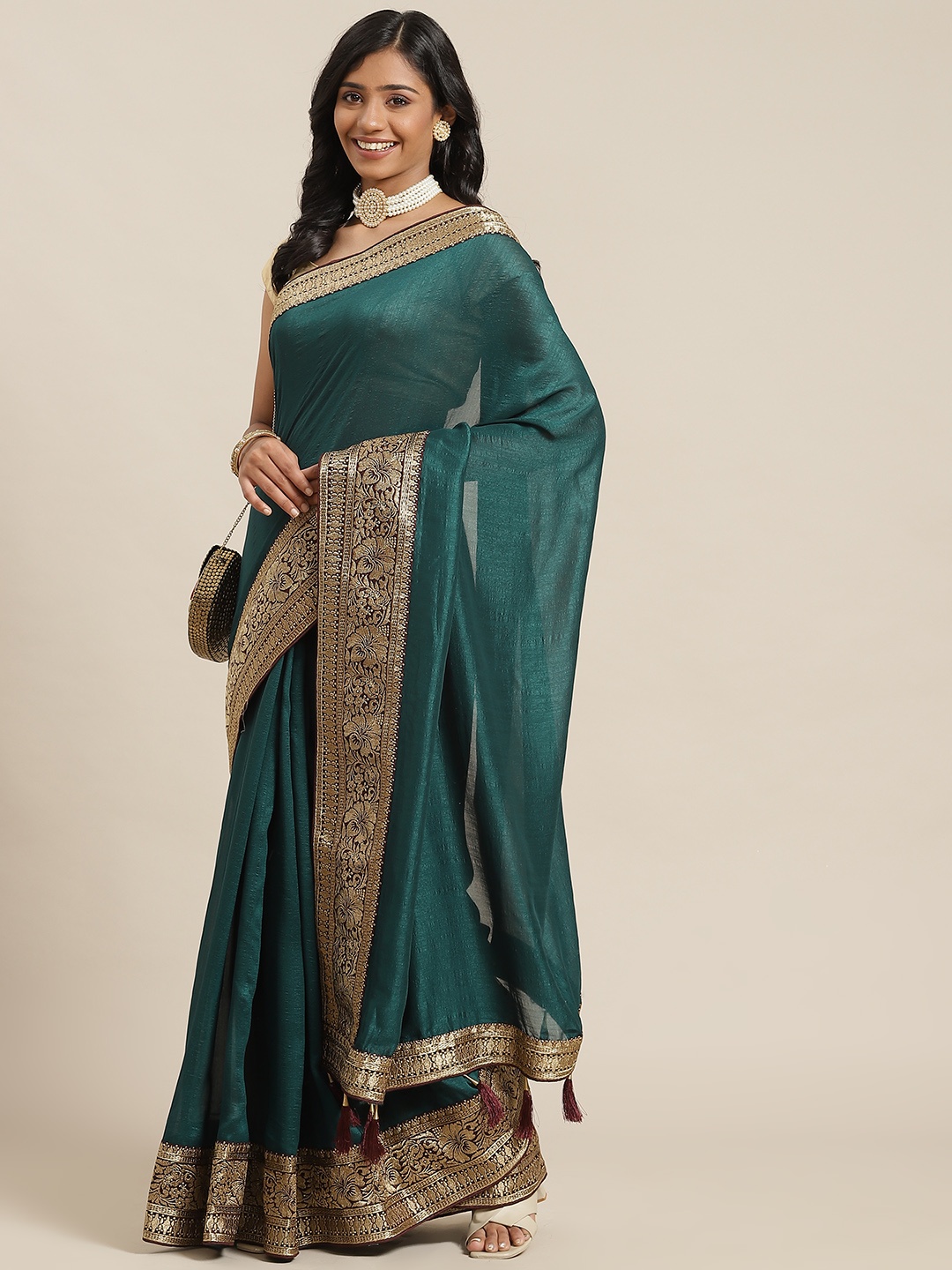 

Libas Teal Silk Blend Saree with Woven Design Blouse Piece