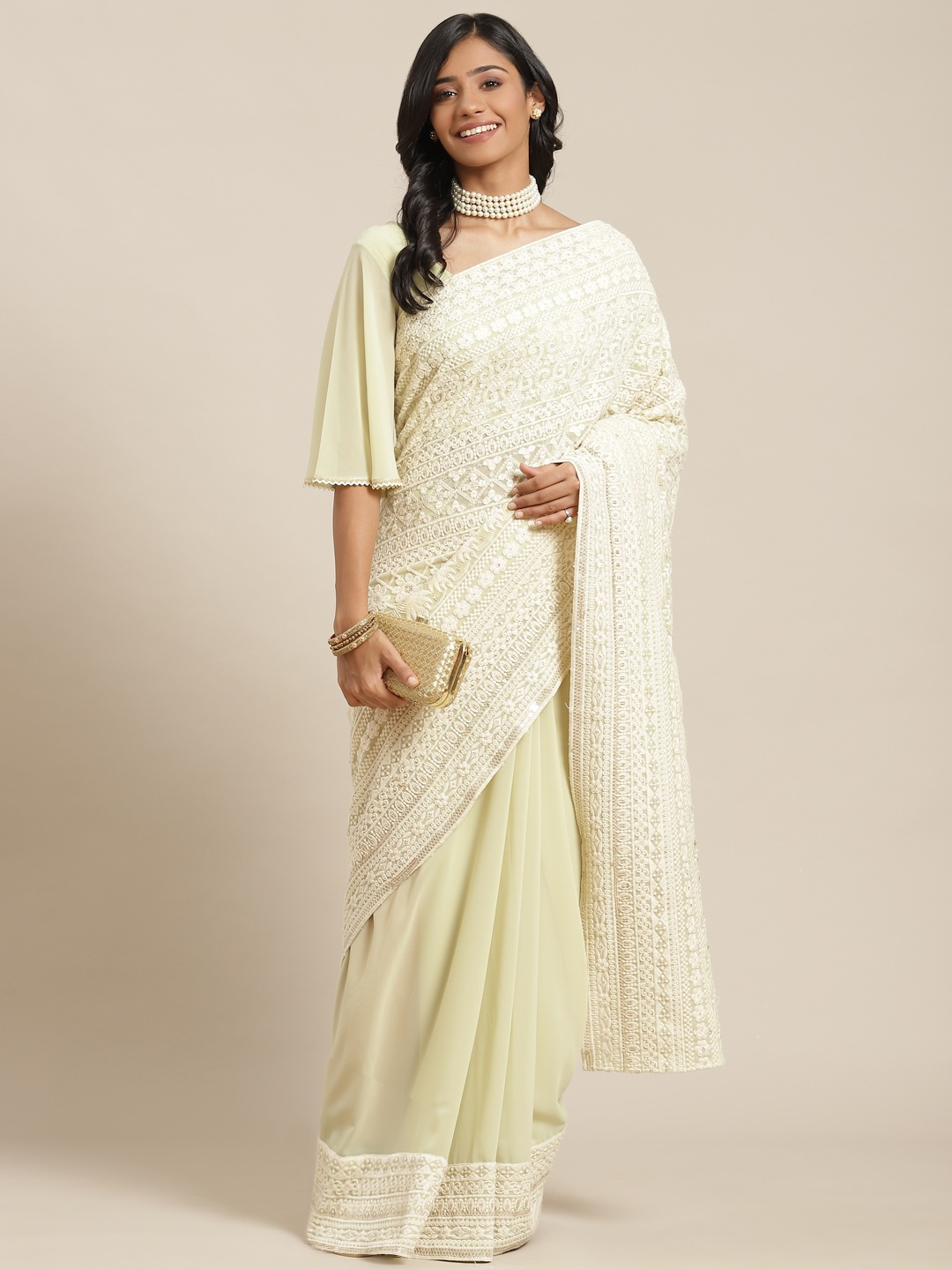 

Libas Green Ethnic Motifs Pure Georgette Saree