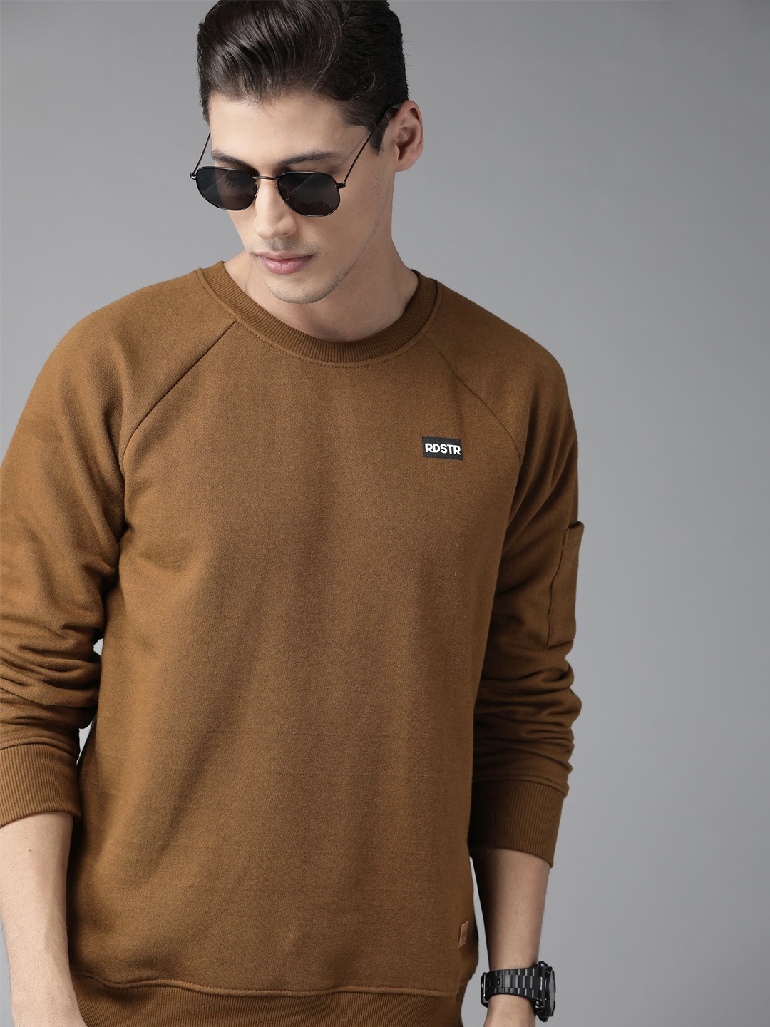 

Roadster Men Brown Solid Sweatshirt