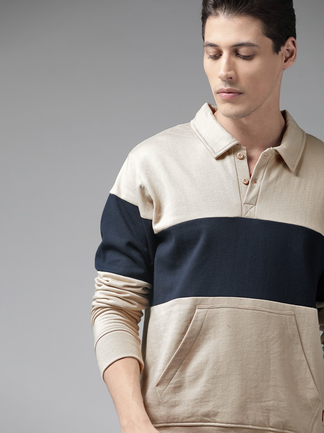 

Roadster Men Off White & Navy Blue Colourblocked Sweatshirt