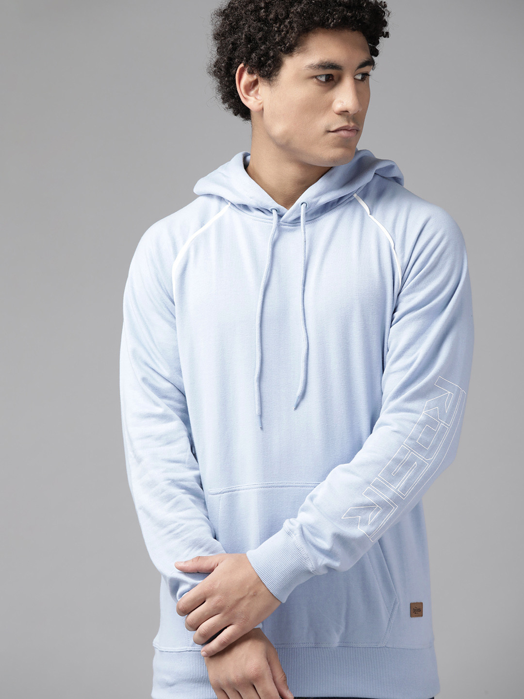 

The Roadster Lifestyle Co. Men Blue Solid Raglan Sleeves Hooded Sweatshirt