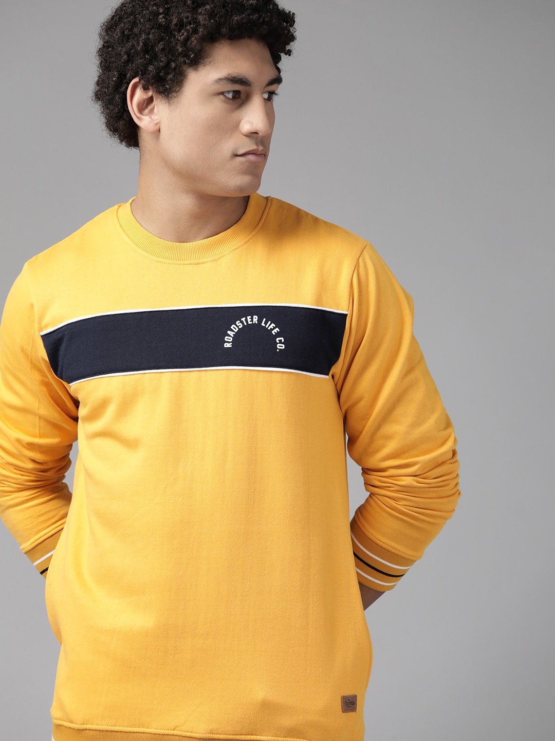 

The Roadster Lifestyle Co. Men Mustard Yellow & Black Striped Sweatshirt