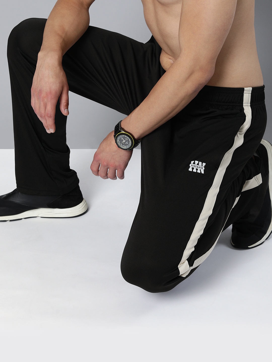 

HERE&NOW Men Black & White Side Striped Loose Fit Track Pants