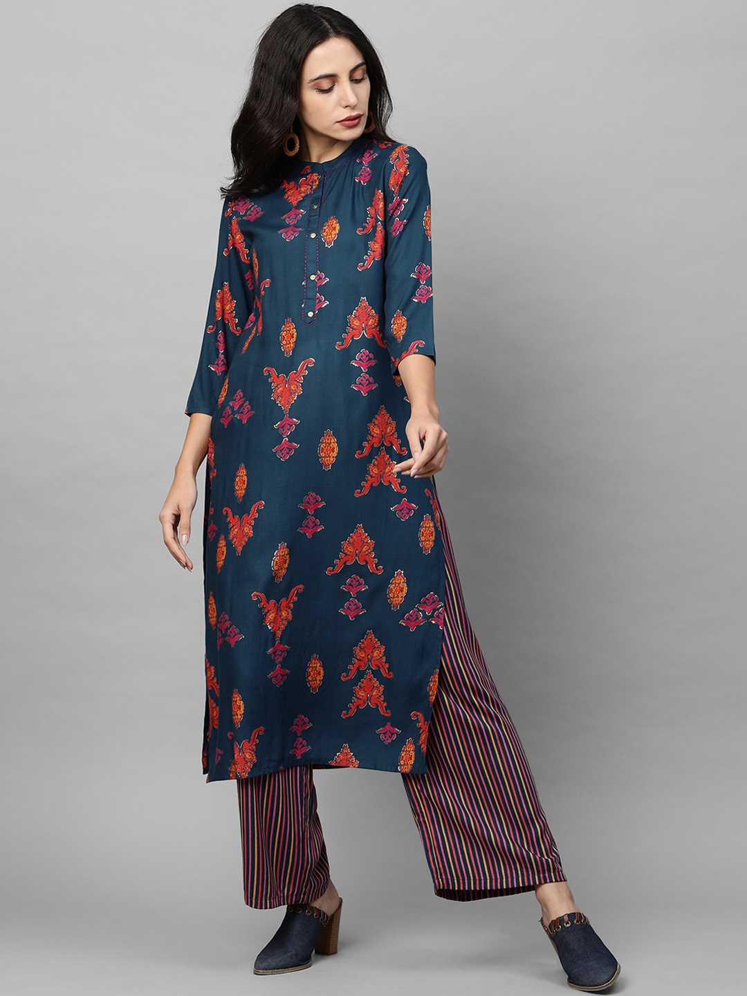

FASHOR Women Teal Ethnic Motifs Printed Regular Kurta with Palazzos