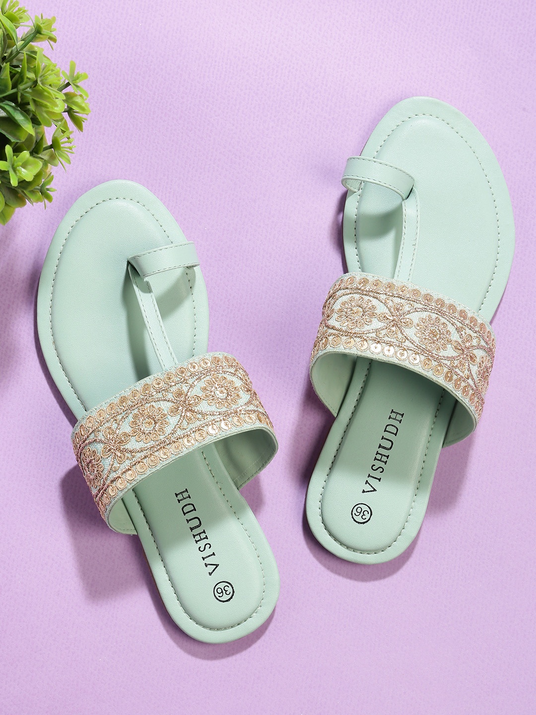 

Vishudh Women Sea Green Embellished One Toe Flats