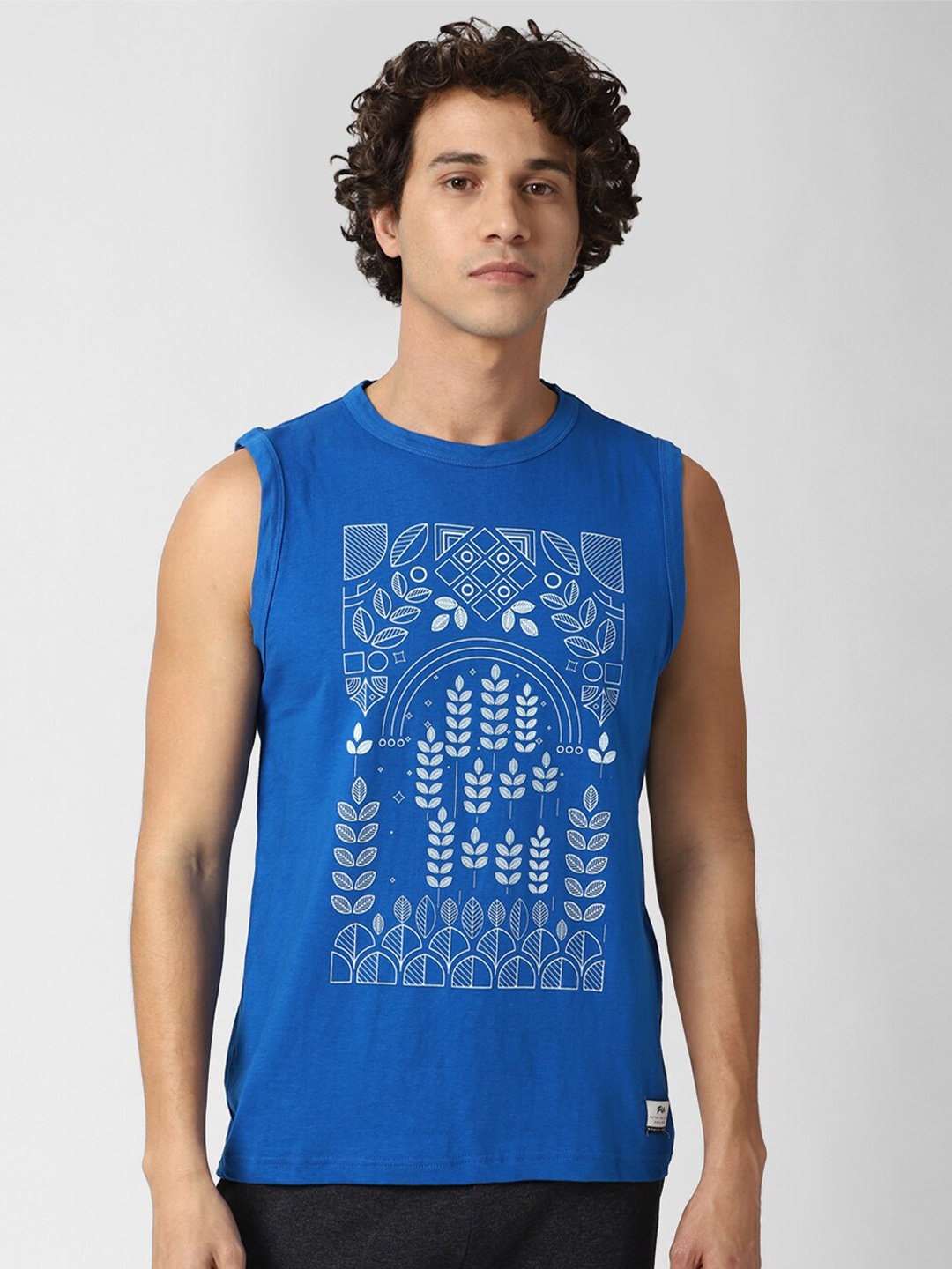 

Peter England Casuals Men Blue & White Printed Lounge T-shirt