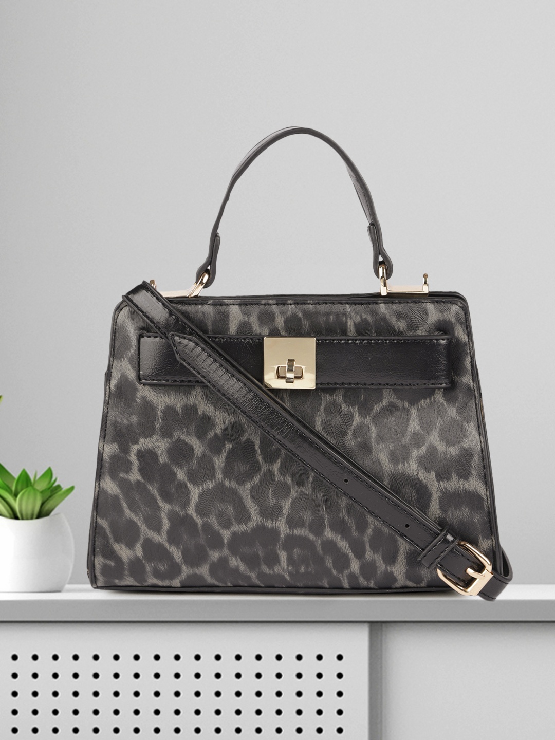 

DressBerry Black Animal Printed PU Structured Sling Bag
