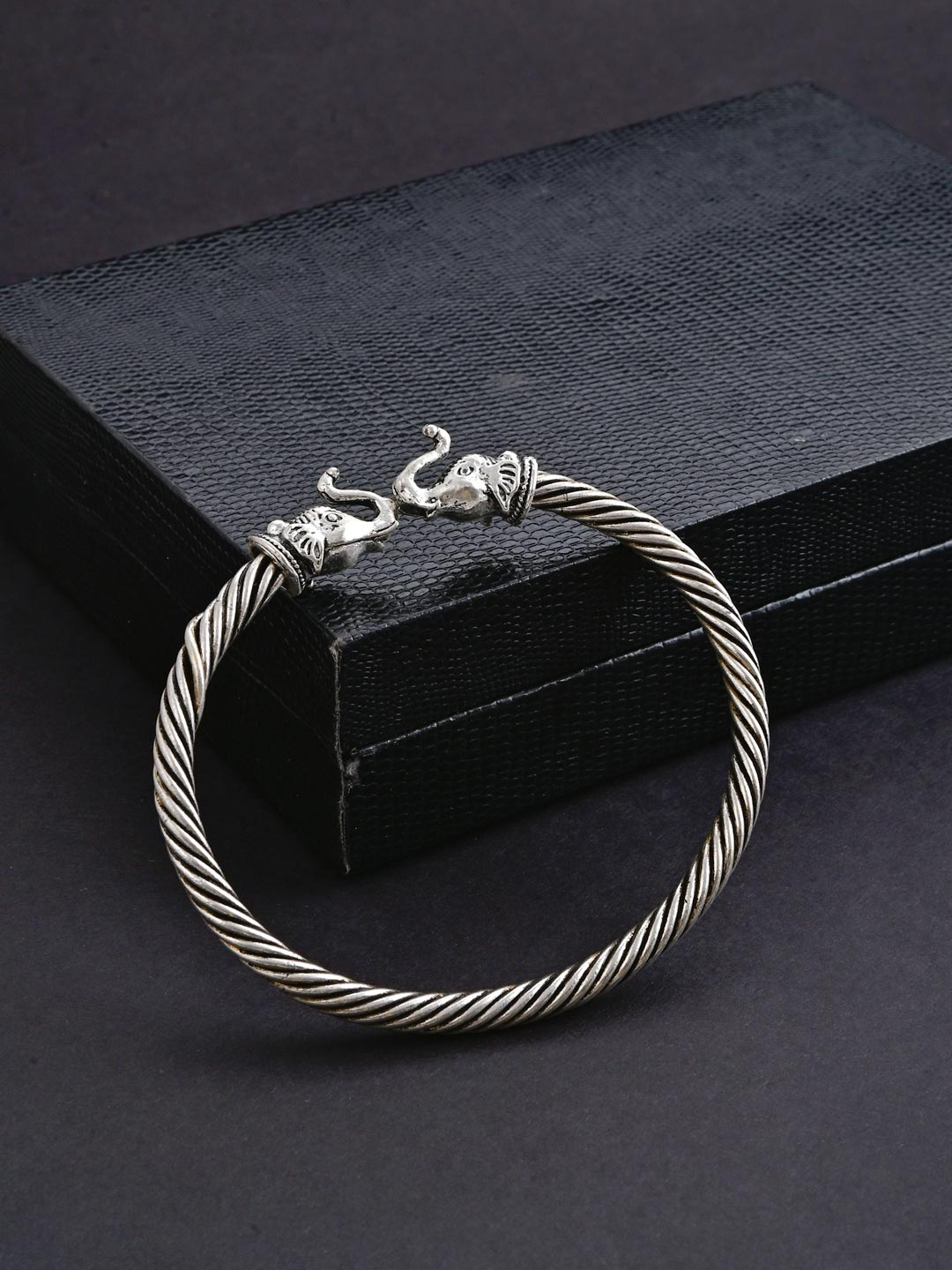 

Tistabene Men Silver-Toned & Plated Oxidized Elephant Kada