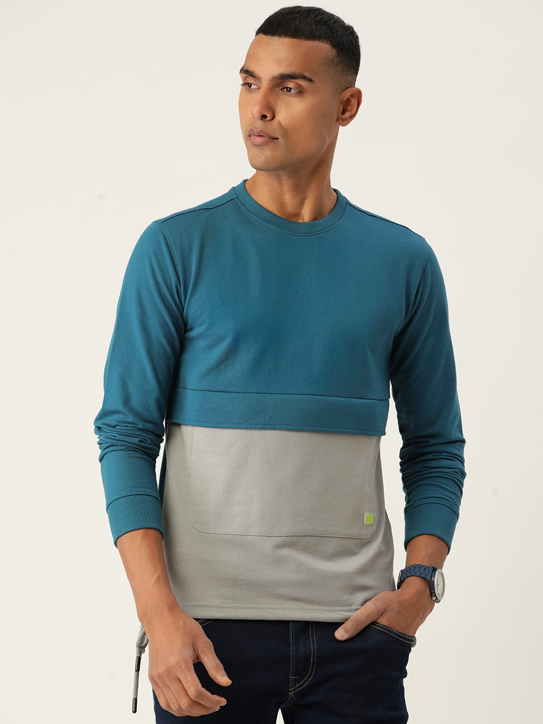 

Peter England Casuals Men Colourblocked Sweatshirt, Teal