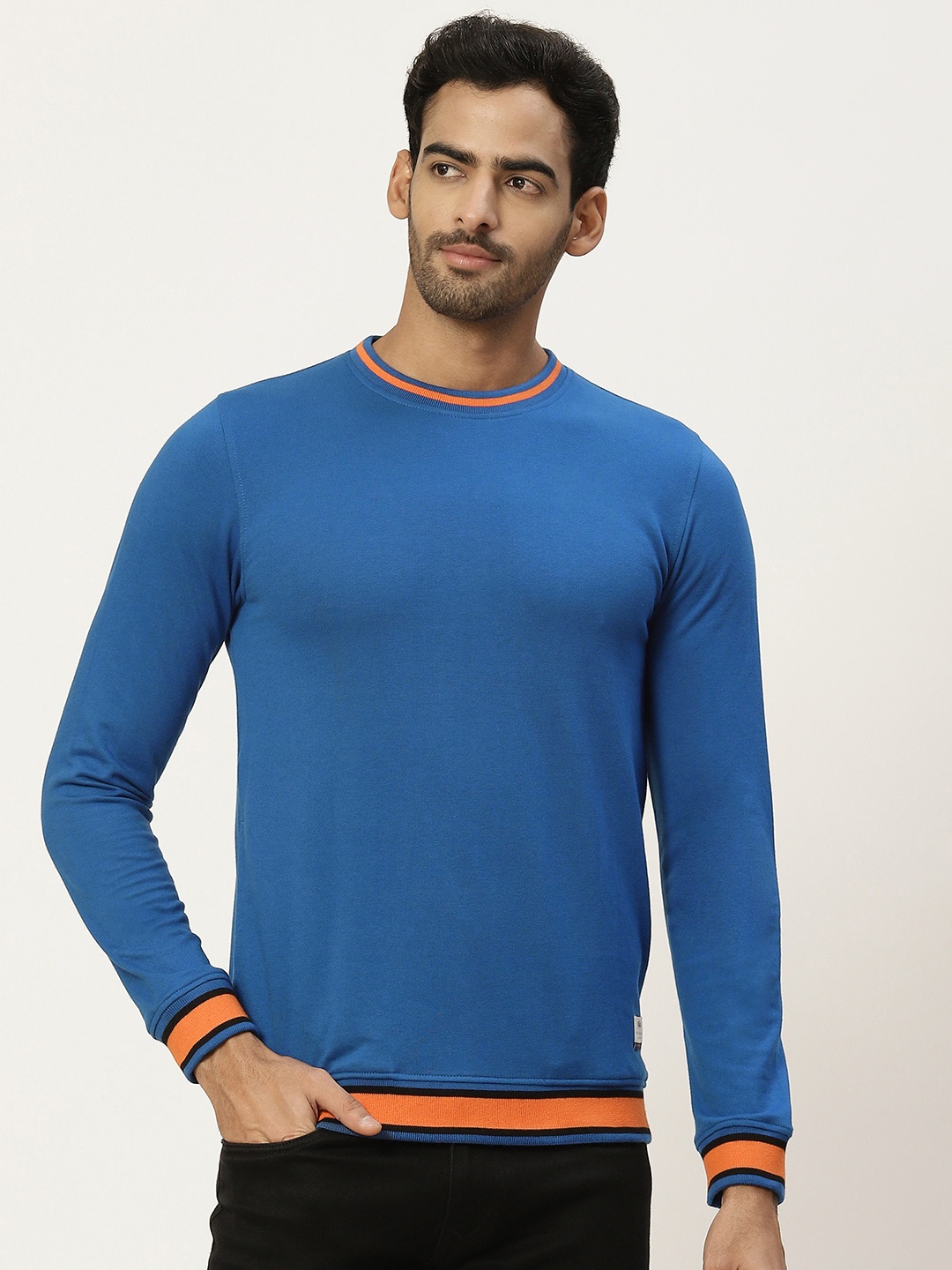 

Peter England Casuals Men Solid Sweatshirt, Blue