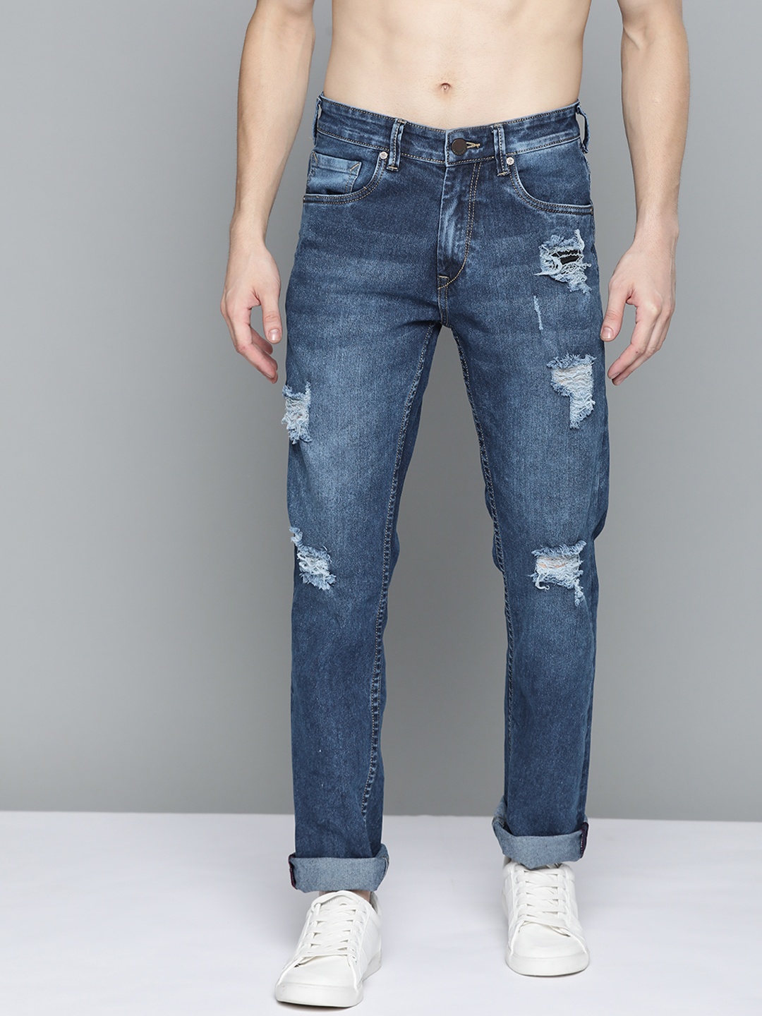 

HERE&NOW Men Blue Slim Fit Mildly Distressed Light Fade Stretchable Jeans