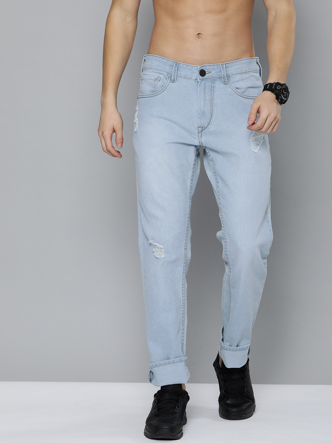 

HERE&NOW Men Blue Slim Fit Mid Rise Mildly Distressed Stretchable Jeans