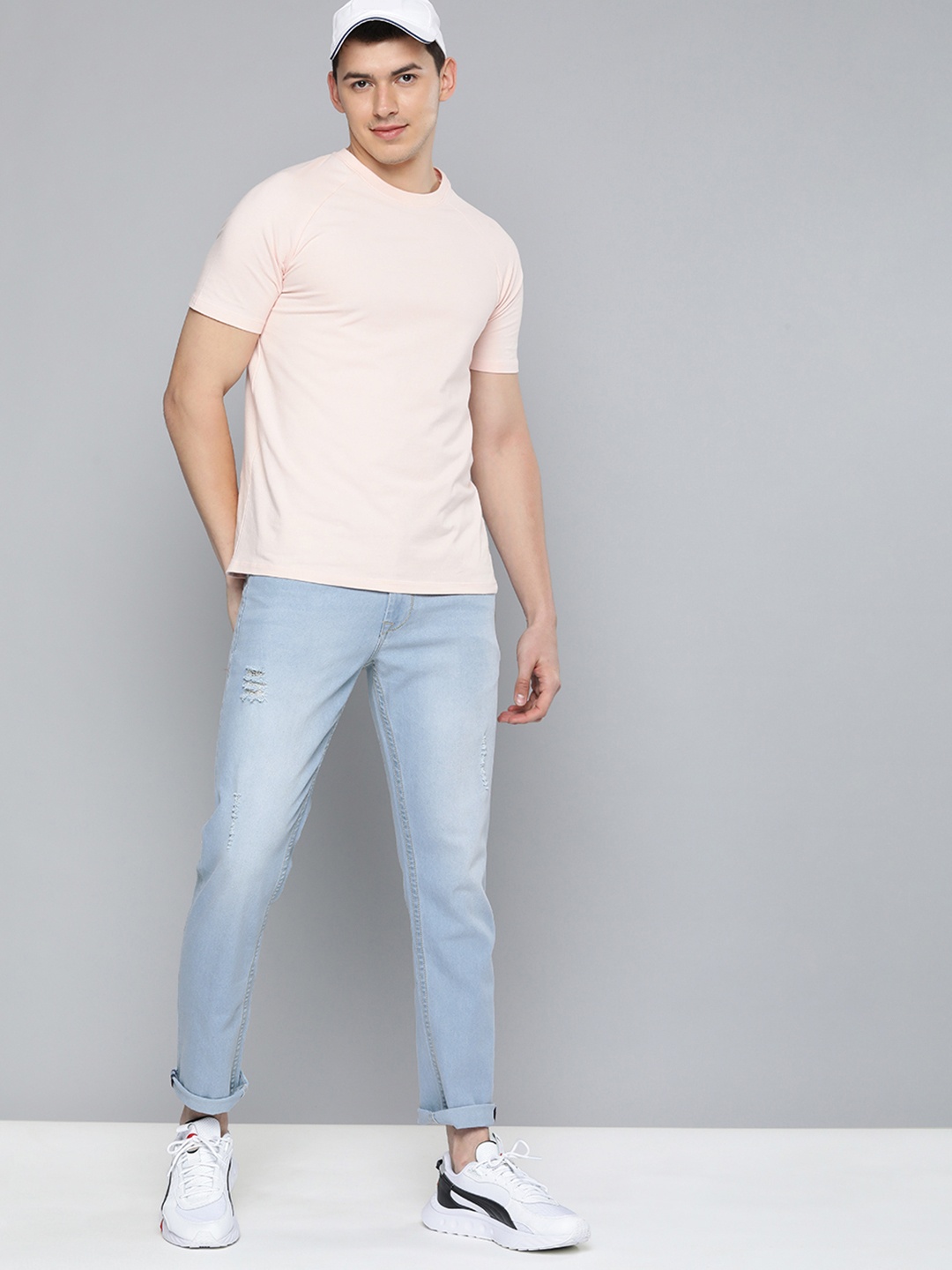 

HERE&NOW Men Blue Slim Fit Mildly Distressed Mid Rise Light Fade Stretchable Jeans