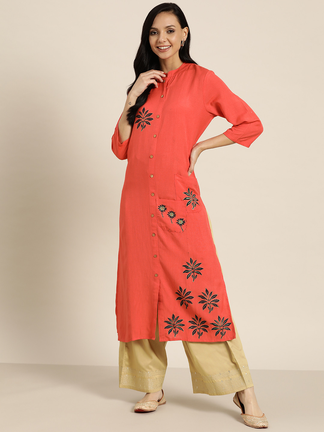 

Sangria Women Peach-Coloured & Black Floral Kurta