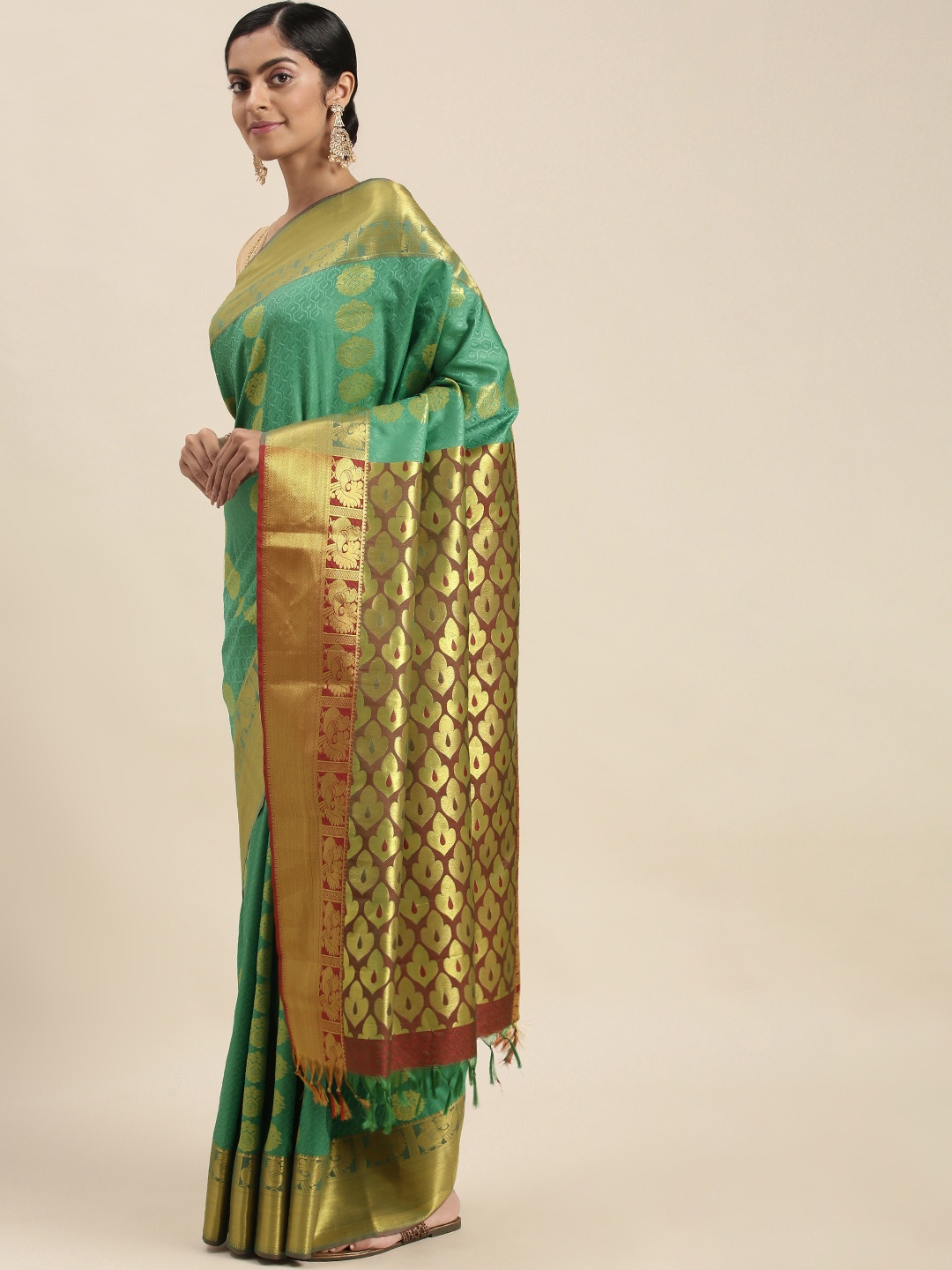 

Thara Sarees Sea Green & Golden Ethnic Motifs Zari Art Silk Kanjeevaram Saree