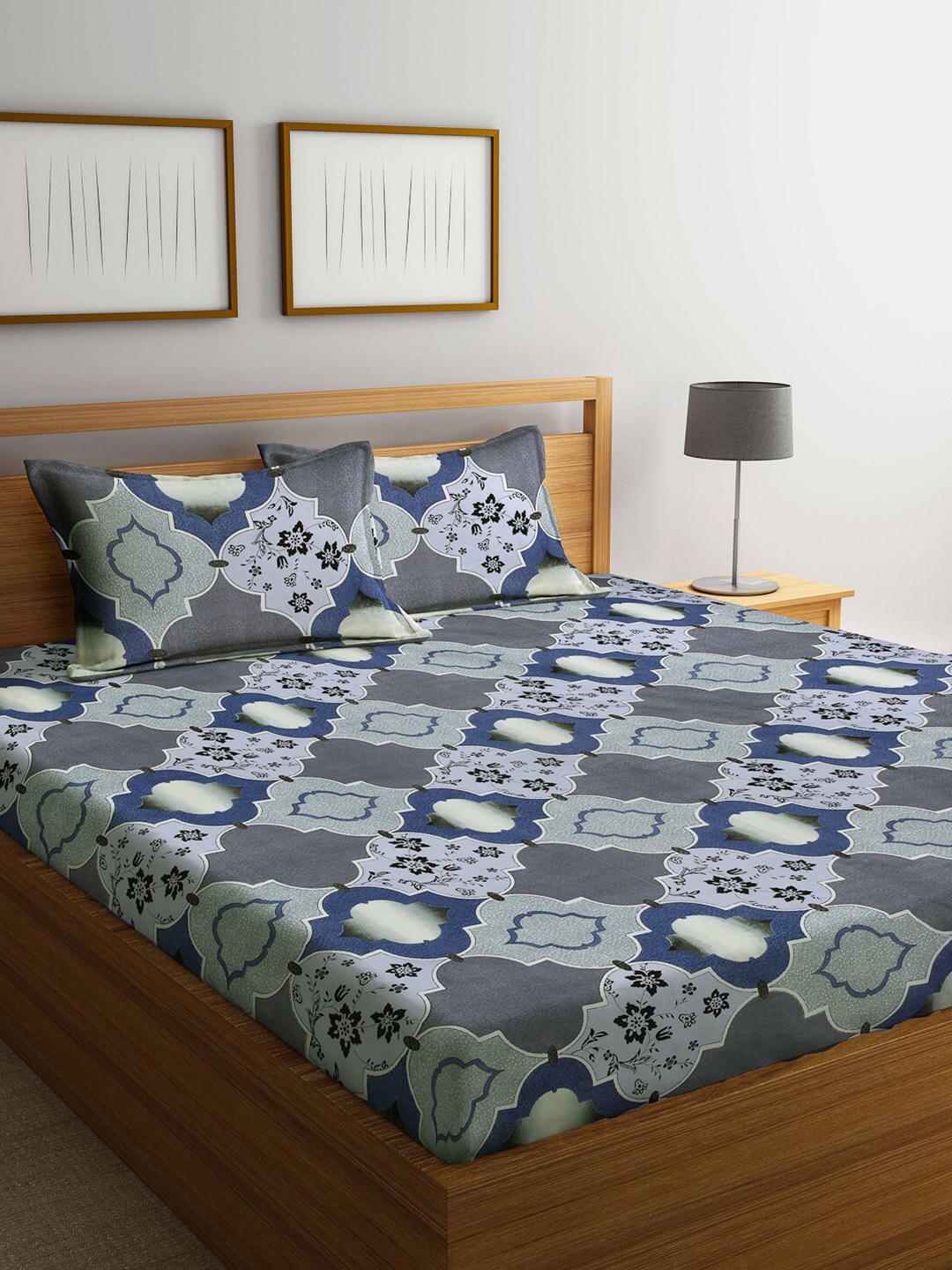 

Arrabi Blue & White Ethnic Motifs 300 TC King Bedsheet with 2 Pillow Covers