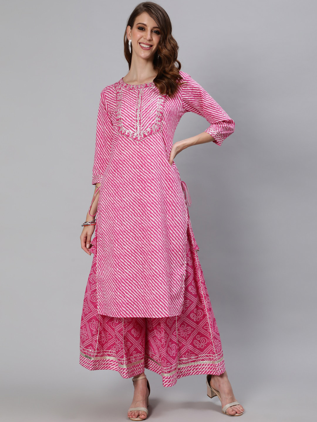

Ishin Women Pink Leheriya Printed Regular Thread Work Pure Cotton Kurta with Sharara