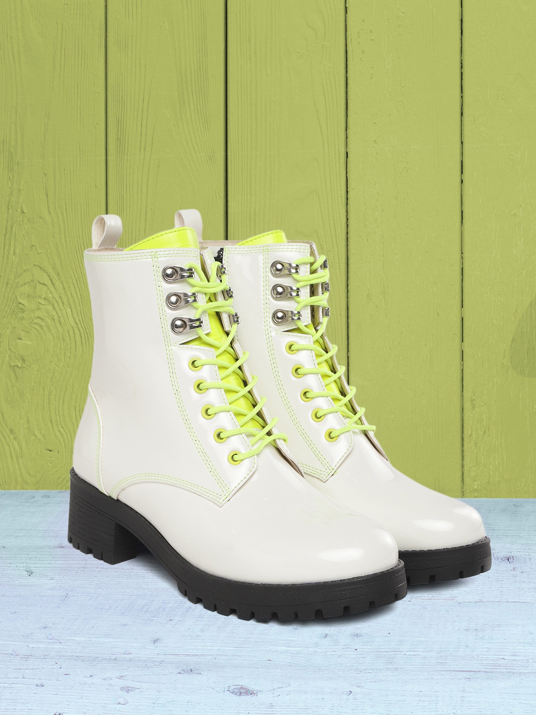 

Kook N Keech Women White Solid Mid-Top Flat Boots