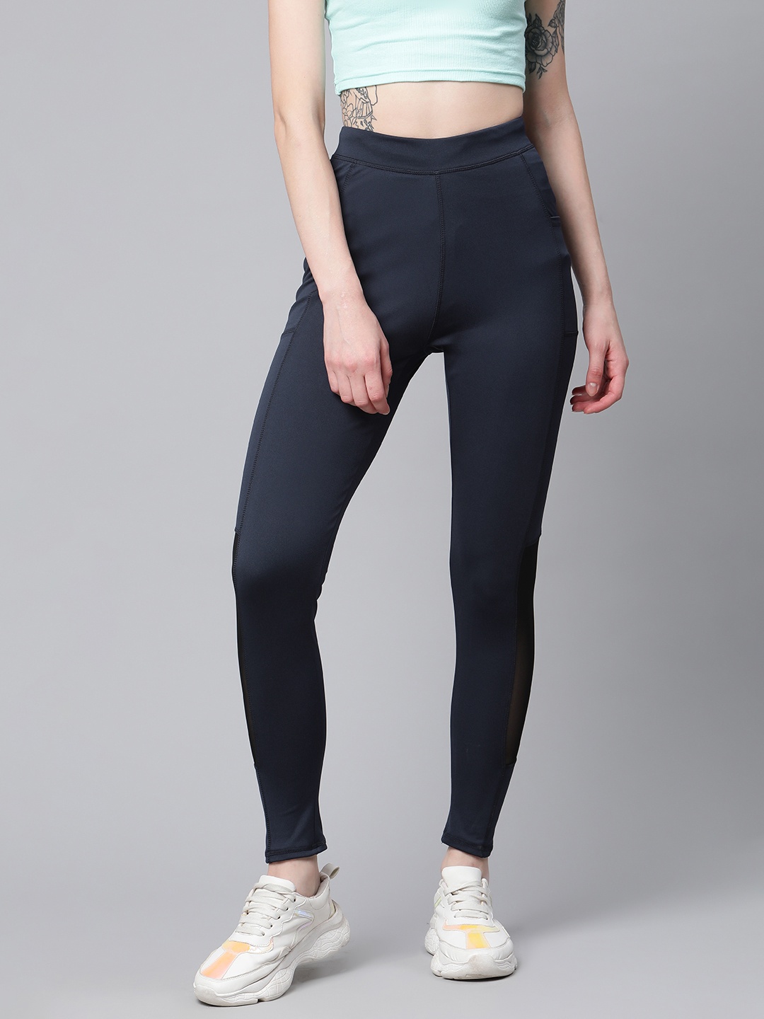 

Blinkin Women Navy Blue Solid High-Rise Gym Tights with Mesh Panelling