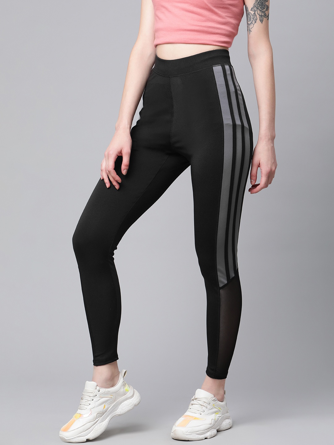 

Blinkin Women Black & Grey Solid Training Tights with Mesh Inserts Detail
