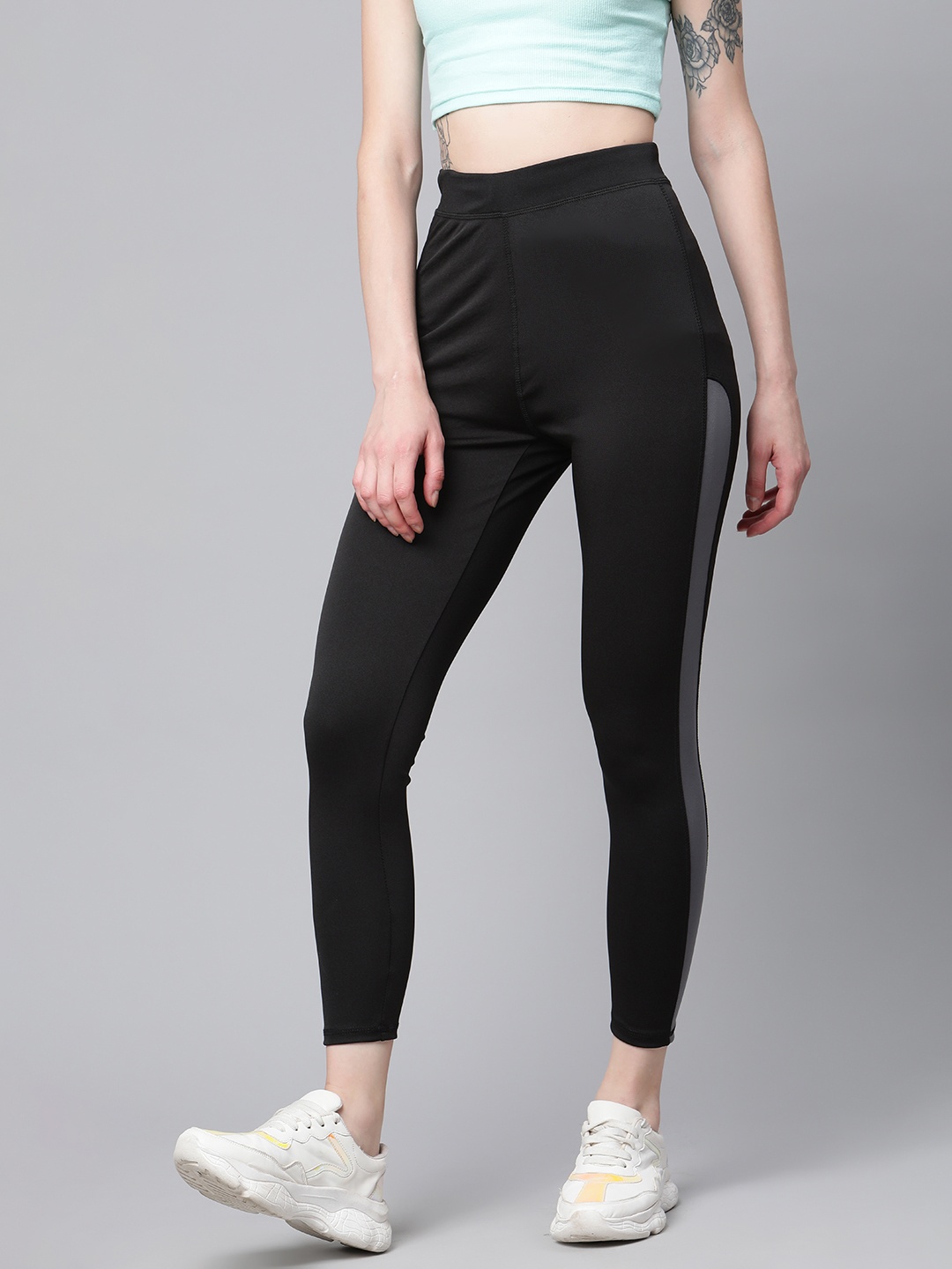 

Blinkin Women Black & Grey Solid Crop Training Tights