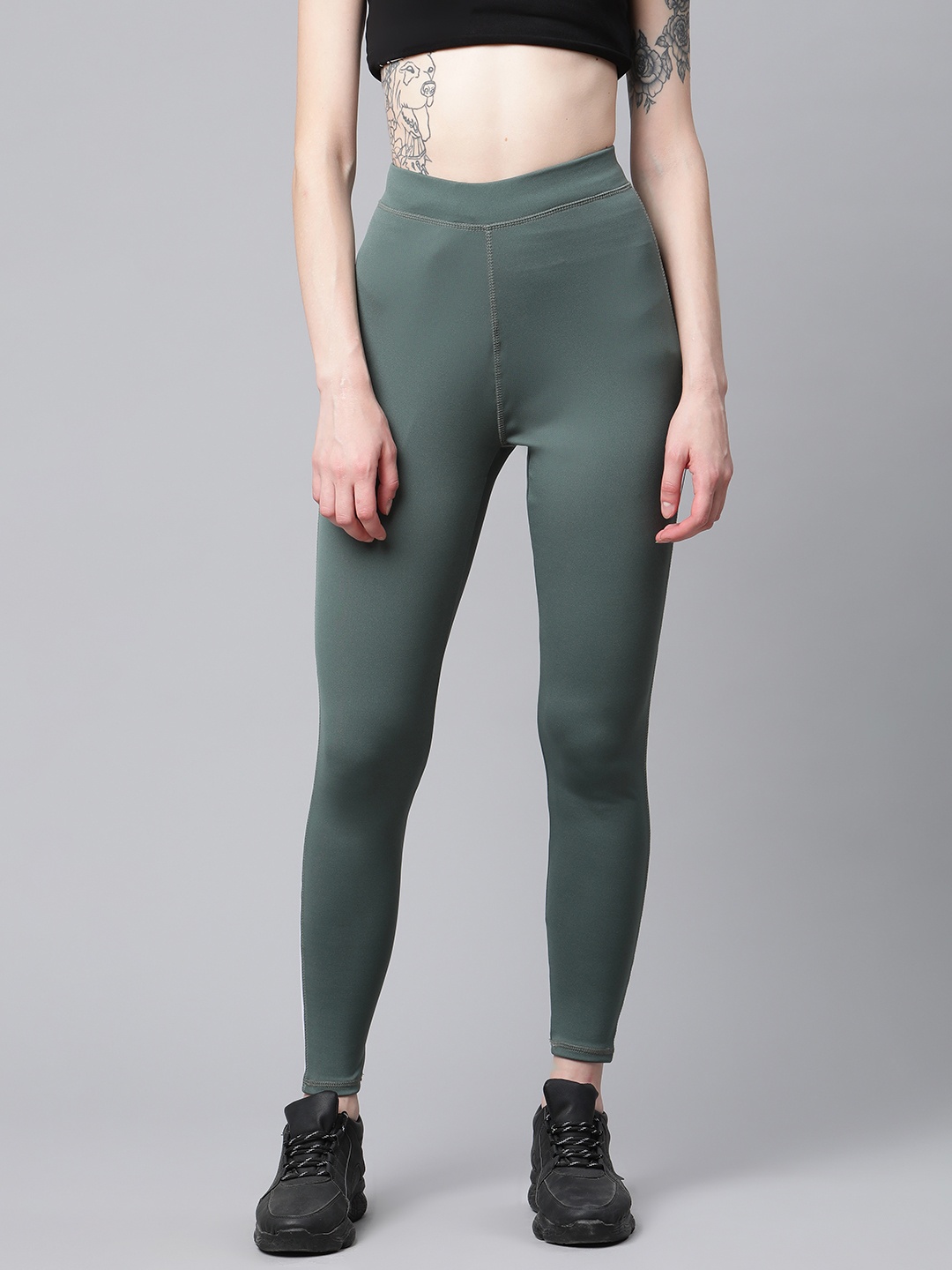 

Blinkin Women Green & White Solid High-Rise Tights with Side Taping