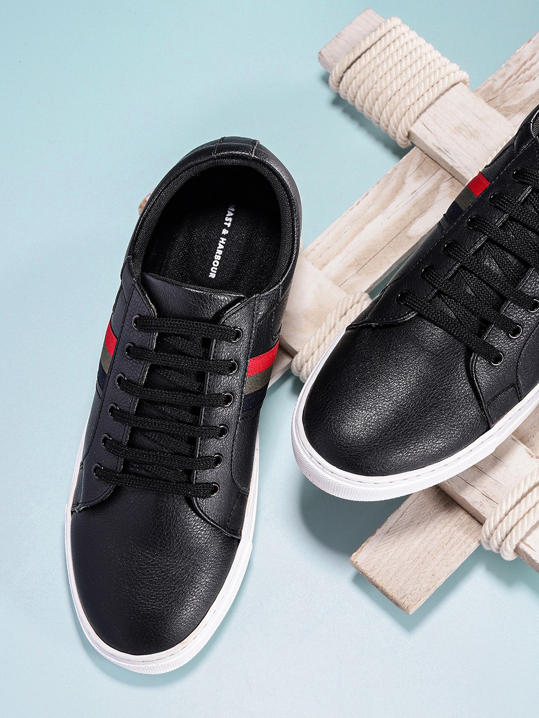 

Mast & Harbour Men Black Solid with Striped Detail Sneakers