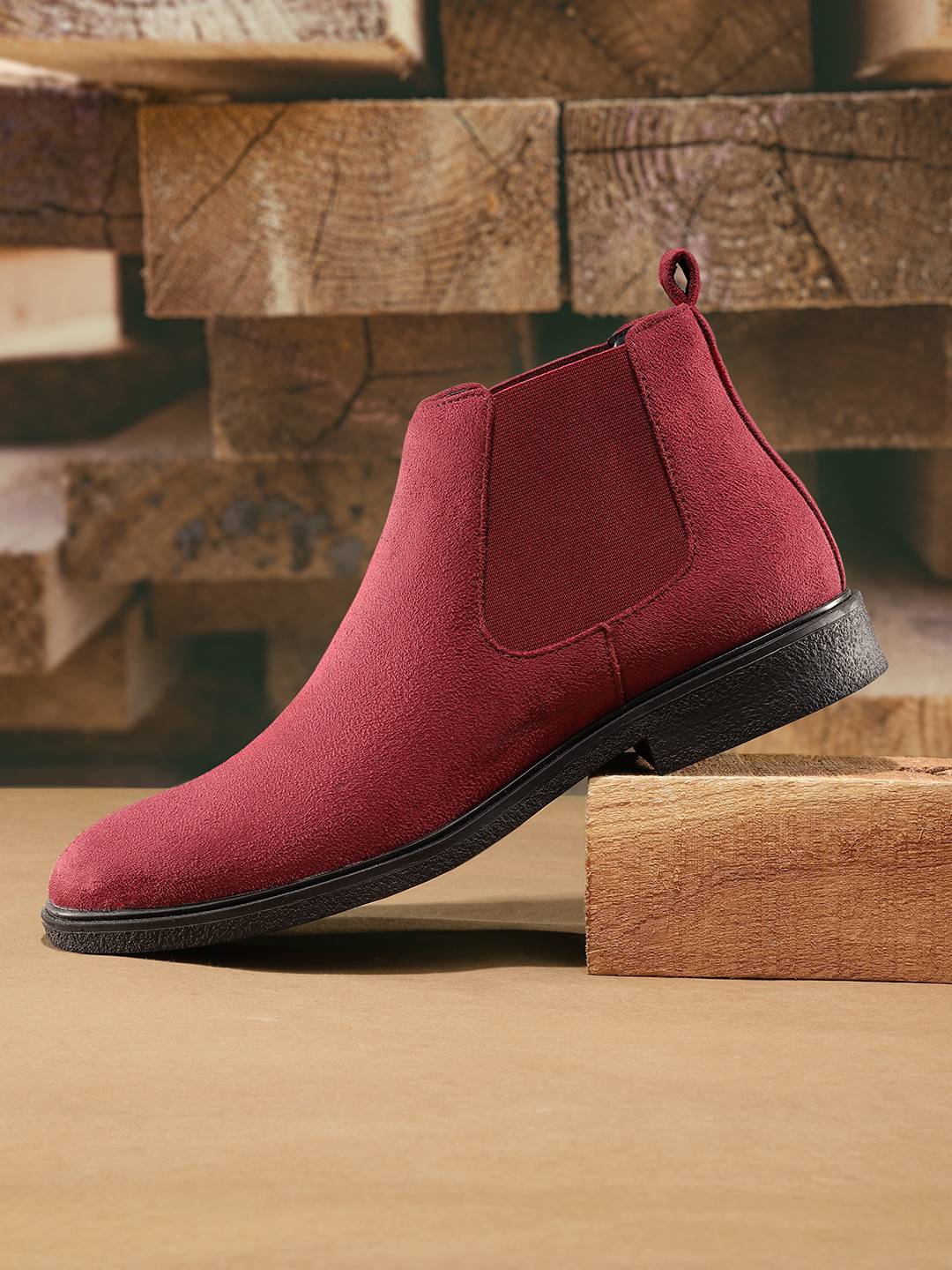 

Roadster Men Burgundy Solid Suede Finish Mid-Top Chelsea Flat Boots