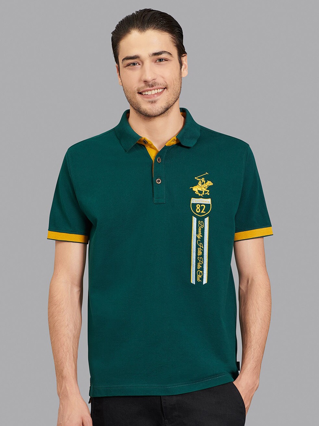 

Beverly Hills Polo Club Men Green & Yellow Typography Polo Collar T-shirt