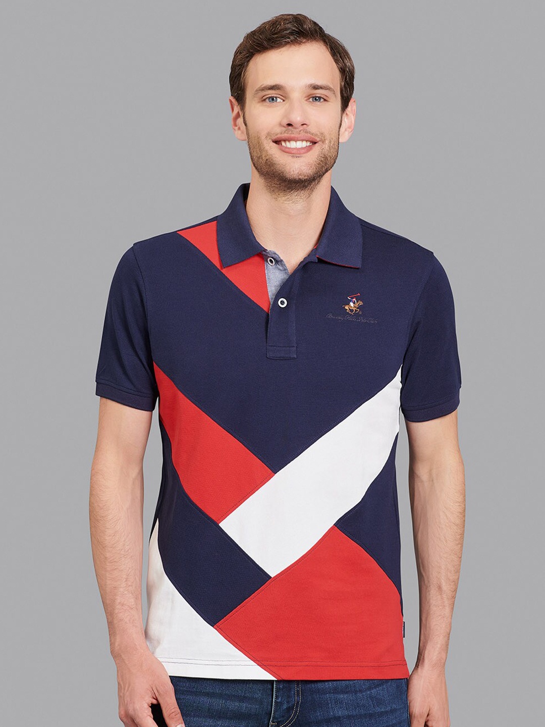 

Beverly Hills Polo Club Men Navy Blue & Coral Colourblocked Polo Collar T-shirt