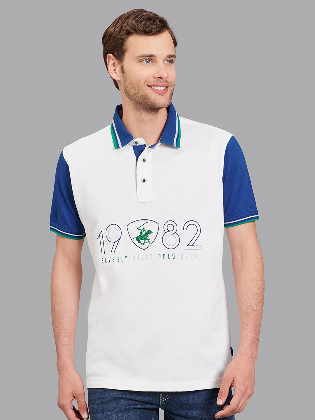 

Beverly Hills Polo Club Men White & Blue Colourblocked Polo Collar T-shirt